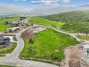 Secluded cul-de-sac lot offering panoramic views, year-round access, and the perfect setting for your custom mountain retreat.