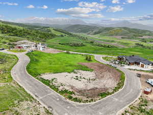 Secluded cul-de-sac lot offering panoramic views, year-round access, and the perfect setting for your custom mountain retreat.