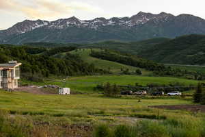 View of mountain background featuring rural landscape