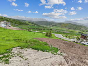 View of mountain backdrop featuring rural landscape
