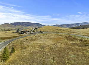 1.11-acre cul-de-sac lot in Trappers Crossing with stunning views. Year-round access. Utilities available