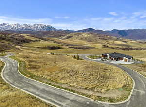 Secluded cul-de-sac lot offering panoramic views, year-round access, and the perfect setting for your custom mountain retreat.