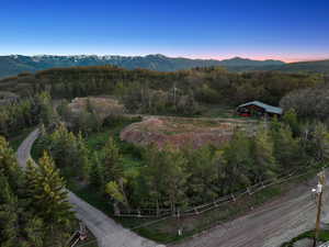 View of mountain backdrop featuring a heavily wooded area |12.48-Acre Horse Property with Barn, Views & Utilities – Build-Ready Lot in Silver Creek Estates, Park City, UT