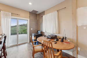 Roper Pole Barn | Conditioned Use |Dining room featuring wood finished floors and recessed lighting