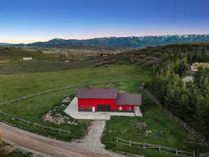 View of rural area with mountains | 12.48-Acre Horse Property with Barn, Views & Utilities – Build-Ready Lot in Silver Creek Estates, Park City, UT