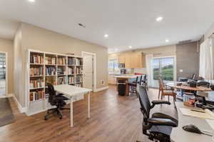 Roper Pole Barn | Conditioned Use |Home office featuring baseboards, wood finished floors, recessed lighting, and plenty of natural light