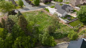 Aerial overview of property's location with nearby suburban area