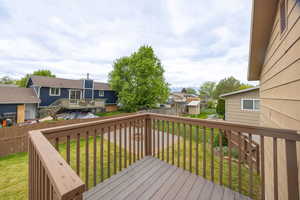 Wooden deck featuring a residential view