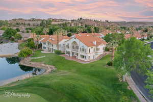Aerial view at dusk of a residential view and a water view