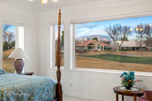 Bedroom featuring baseboards and ornamental molding