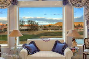 Living room featuring view of golf course
