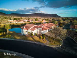 Aerial view of residential area with a water and mountain view