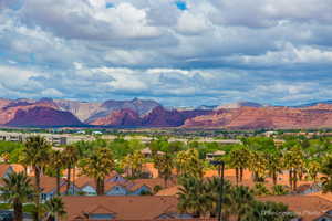 View of mountain background featuring nearby suburban area