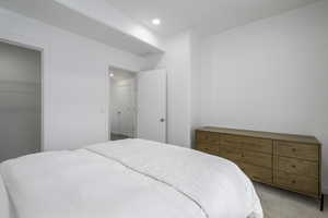 Bedroom featuring carpet floors and recessed lighting