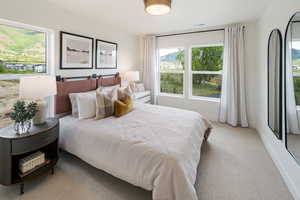 Bedroom with light carpet