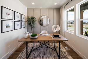 Office space featuring dark wood-type flooring, recessed lighting, and baseboards