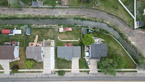 View of property location. shows canal that borders backyard