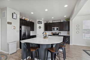 Kitchen featuring a very large island.