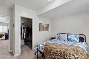 Large bedroom with walk in closet.