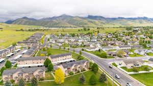 Aerial view of residential area with a mountain backdrop