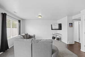 Living area featuring baseboards