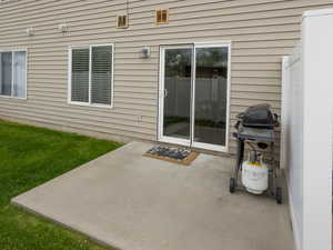 Back of property with a patio area