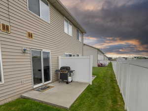 Rear view of house with a patio area