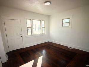 Living room has a lot of light and beautiful floor