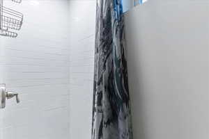 Bathroom featuring a stall shower