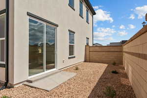 View of yard featuring fence