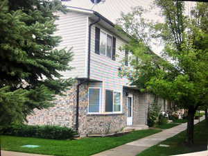 View of front of property with a front yard