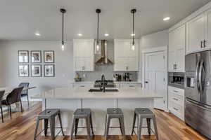 Gourmet Kitchen, large island, bar, stainless steal appliances
