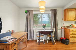 Dining area featuring light wood-type flooring