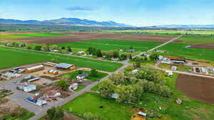 Aerial view of sparsely populated area featuring a mountainous background