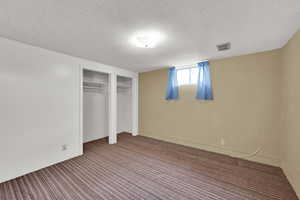Unfurnished bedroom featuring carpet flooring