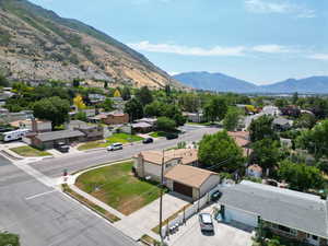 View of mountain background featuring nearby suburban area