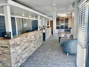 Reception area featuring a textured ceiling