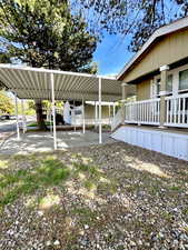 View of yard featuring a carport