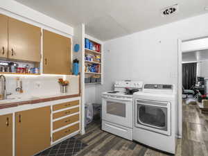 Washroom featuring washer / clothes dryer
