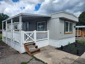 View of home's exterior featuring a porch
