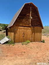 View of outbuilding with an outdoor structure
