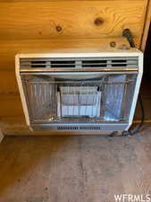 Detailed view of wood finished floors and heating unit