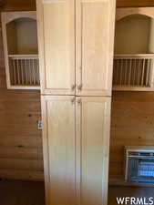 Closet featuring heating unit