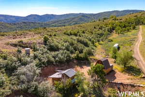 View of subject property featuring mountains