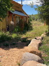 View of yard featuring fence
