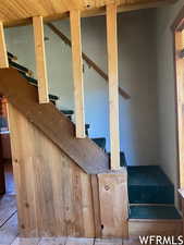 Staircase with wood ceiling