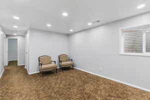 Unfurnished room with carpet floors, recessed lighting, and baseboards