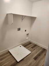 Washroom with washer hookup, wood finished floors, baseboards, and electric dryer hookup