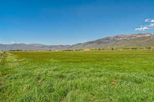 View of mountain background with rural landscape and a pastoral area