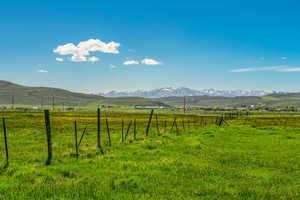View of mountain background with rural landscape and a pastoral area